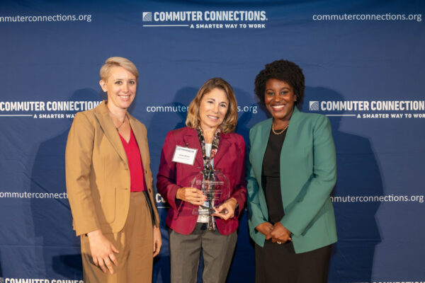 three people smiling